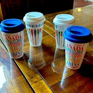 4, Canadian themed 8 oz mugs. Silicon lids, fr Chapters. Like new.